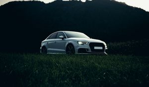 Preview wallpaper audi, car, white, grass, nature