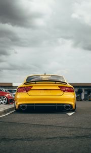 Preview wallpaper audi, car, yellow, back view, road