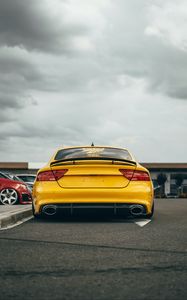 Preview wallpaper audi, car, yellow, back view, road