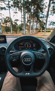 Preview wallpaper audi, interior, steering wheel, speedometer, legs