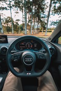 Preview wallpaper audi, interior, steering wheel, speedometer, legs