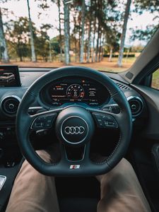 Preview wallpaper audi, interior, steering wheel, speedometer, legs