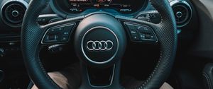 Preview wallpaper audi, interior, steering wheel, speedometer, legs