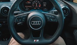 Preview wallpaper audi, interior, steering wheel, speedometer, legs