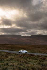 Preview wallpaper auto, road, traffic, mountains, clouds