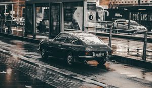 Preview wallpaper auto, side view, city, rain