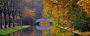 Preview wallpaper autumn, bridge, river, park, trees, reflection