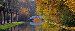 Preview wallpaper autumn, bridge, river, park, trees, reflection