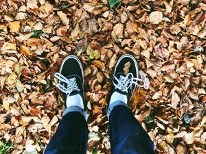 Preview wallpaper autumn, feet, foliage, fallen