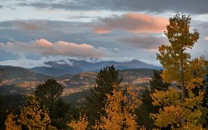 Preview wallpaper autumn, mountains, sky, clouds, trees, aspens, pines, evening