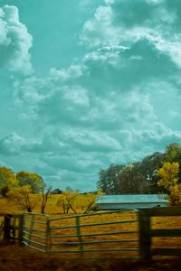 Preview wallpaper autumn, sky, fence, road, paints, colors, cloudy