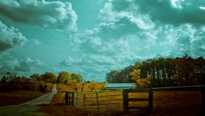 Preview wallpaper autumn, sky, fence, road, paints, colors, cloudy