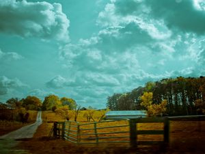 Preview wallpaper autumn, sky, fence, road, paints, colors, cloudy