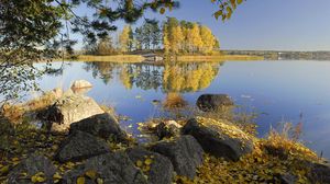 Preview wallpaper autumn, stones, trees, leaves, birches, lake, island, coast