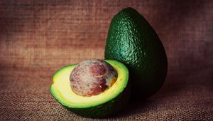 Preview wallpaper avocado, fruit, stone