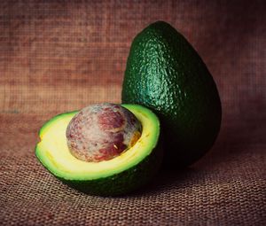 Preview wallpaper avocado, fruit, stone