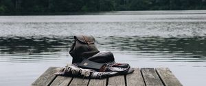 Preview wallpaper backpack, book, pier, river, water, forest
