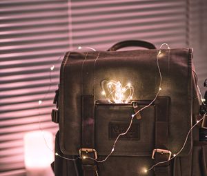 Preview wallpaper backpack, garland, light, glow