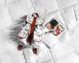 Preview wallpaper backpack, journal, glasses, bed