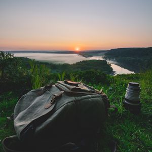 Preview wallpaper backpack, sunset, nature, evening, travel