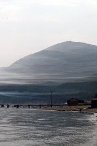 Preview wallpaper baikal, lake, coast, mountain, haze