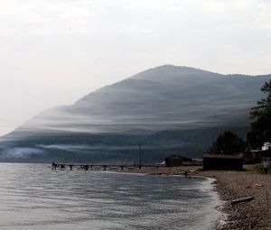 Preview wallpaper baikal, lake, coast, mountain, haze