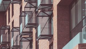 Preview wallpaper balconies, building, facade, bricks, architecture