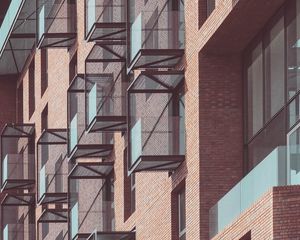 Preview wallpaper balconies, building, facade, bricks, architecture