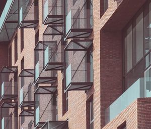 Preview wallpaper balconies, building, facade, bricks, architecture