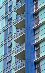 Preview wallpaper balconies, facade, windows, glass, blue