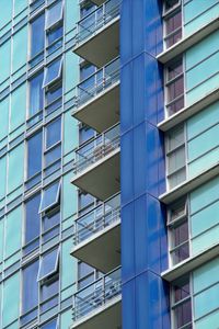 Preview wallpaper balconies, facade, windows, glass, blue