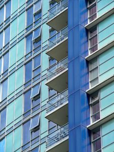 Preview wallpaper balconies, facade, windows, glass, blue