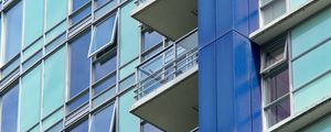 Preview wallpaper balconies, facade, windows, glass, blue