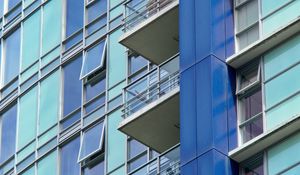 Preview wallpaper balconies, facade, windows, glass, blue