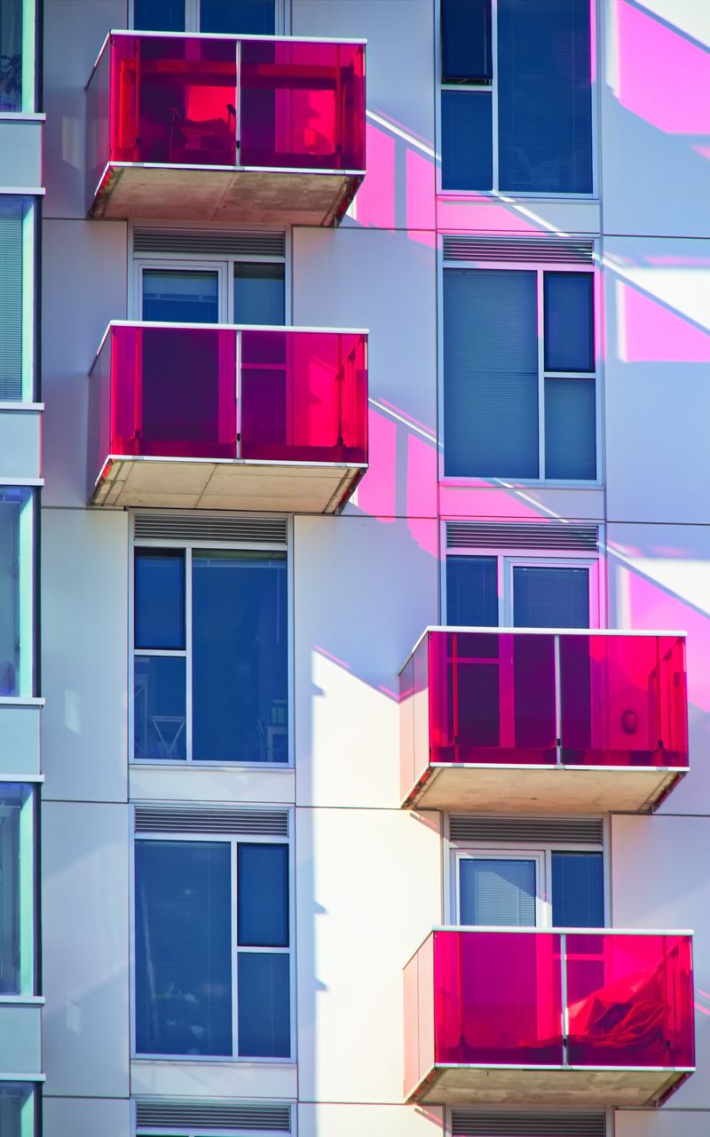 800x1280 Wallpaper balconies, windows, facade, glass