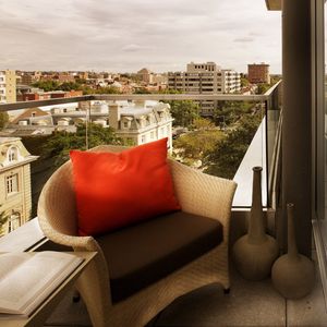 Preview wallpaper balcony, house, apartment, armchair, view