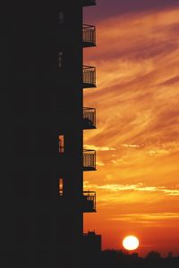 Preview wallpaper balcony, sunset, sky, skyline, city