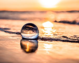 Preview wallpaper ball, coast, sunset, sea, reflection
