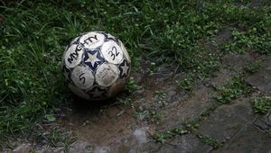 Preview wallpaper ball, football, dirt, grass