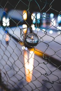 Preview wallpaper ball, glass, fence, mesh, light