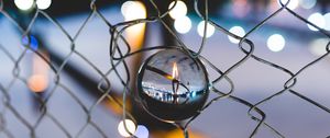 Preview wallpaper ball, glass, fence, mesh, light
