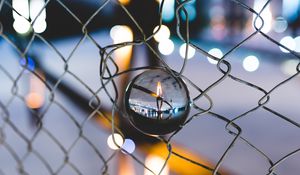 Preview wallpaper ball, glass, fence, mesh, light