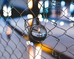 Preview wallpaper ball, glass, fence, mesh, light