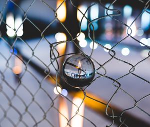 Preview wallpaper ball, glass, fence, mesh, light