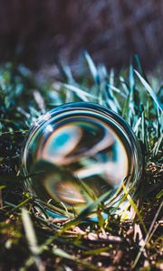 Preview wallpaper ball, glass, grass, close-up