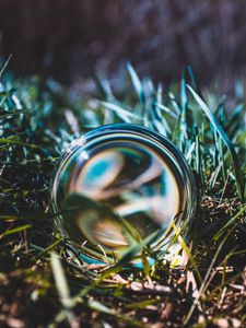 Preview wallpaper ball, glass, grass, close-up