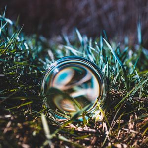 Preview wallpaper ball, glass, grass, close-up