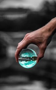 Preview wallpaper ball, glass, hand, transparent, reflection