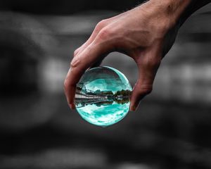 Preview wallpaper ball, glass, hand, transparent, reflection