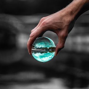 Preview wallpaper ball, glass, hand, transparent, reflection